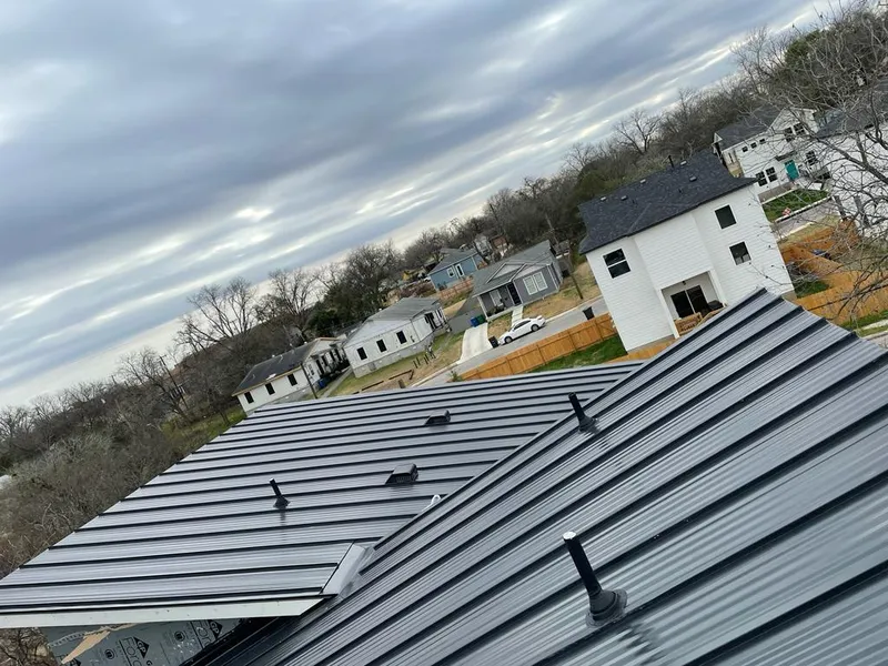 Standing seam metal roof panels with vents for Skylight Repair in Cranford